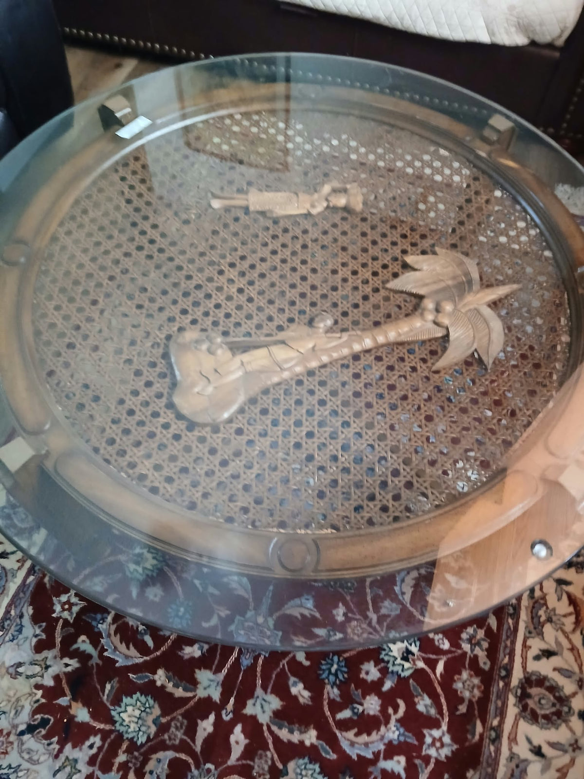 Round Glass-Top Cane Table with Carved Palm Tree Scene