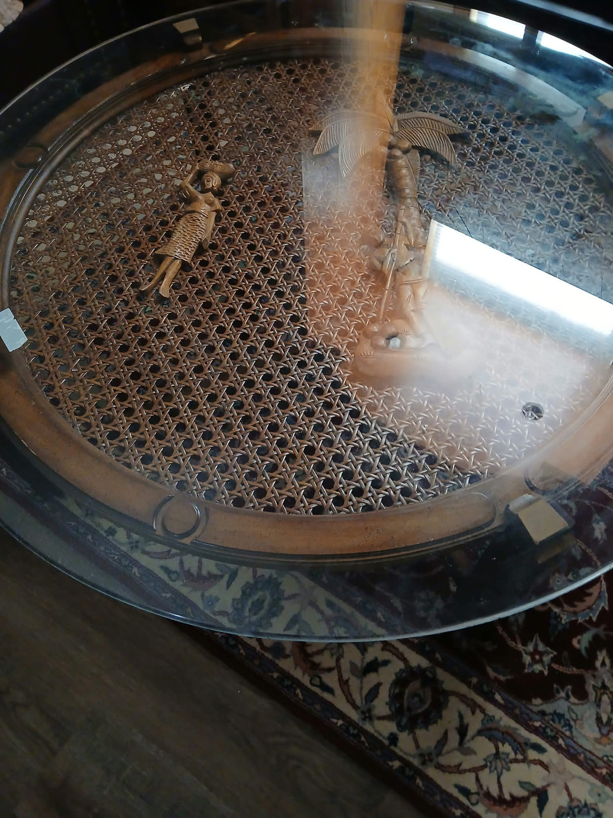 Round Glass-Top Cane Table with Carved Palm Tree Scene