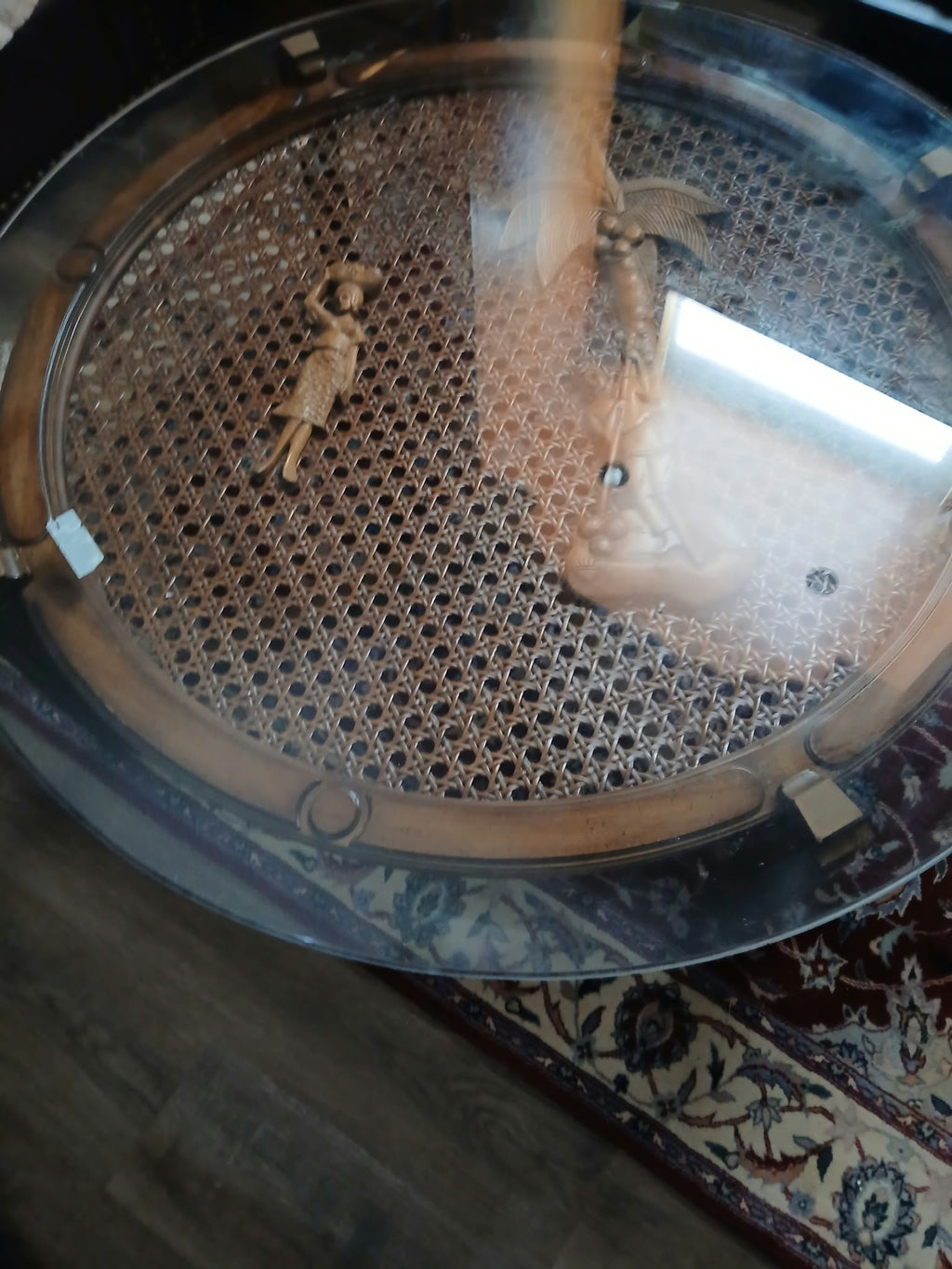 Round Glass-Top Cane Table with Carved Palm Tree Scene